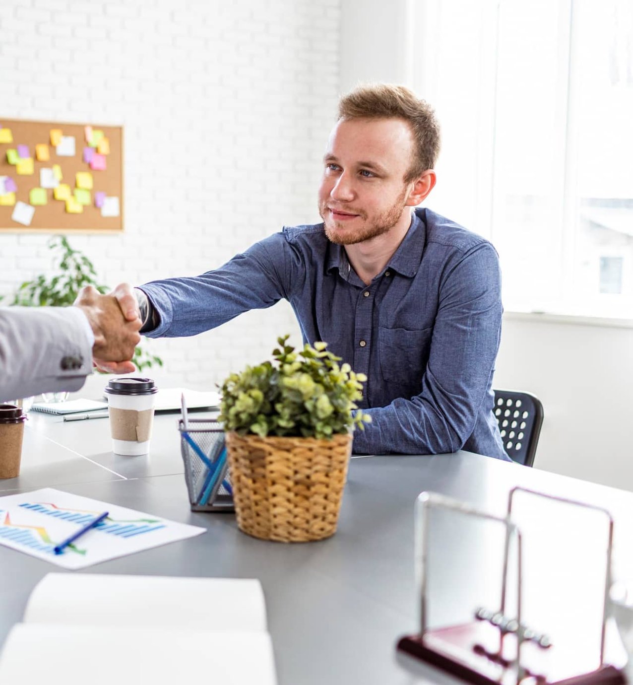 Hive Talent consultant meeting with a professional in a modern office