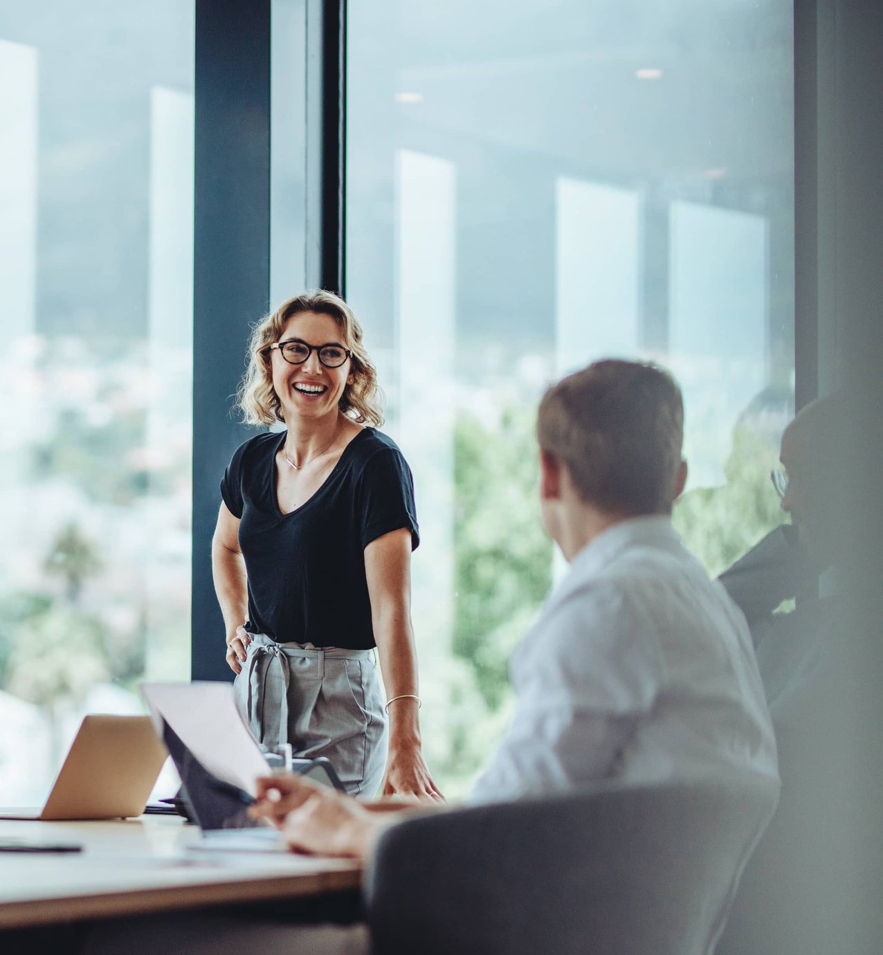 Hive Talent consultant meeting with a professional in a modern office